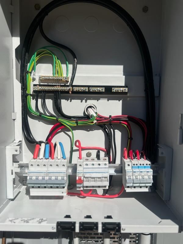 Neatly wired modern switchboard with circuit breakers, safety switches, earthing and labelled circuits